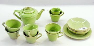 Art Deco style doll's pottery part tea service, green glazed