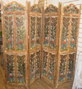 An Indian-style pierced and painted folding screen, decorated with peacocks, 180cm high