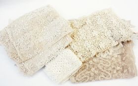 A large quantity of black, cream and other lace