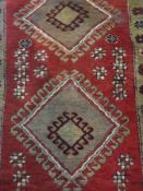 Turkish Malatya wool rug, red ground with hooked guls and blue and red cotton Kelim (2)