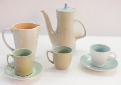 A Poole pottery coffee pot, grey with blue lid, sundry tea and coffee cups, various glazes, gravy
