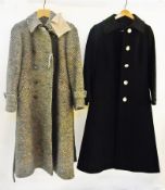 A black Aquascutum wool coat with large brass-coloured buttons and a wool tweed Aquascutum double-