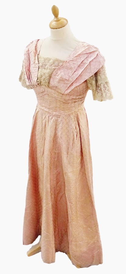 A Victorian evening dress trimmed with lace on the bodice and sleeves, a 19th century embroidered - Image 2 of 5