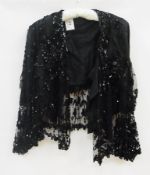A black net and satin Victorian jacket, heavily decorated with sequins (af)