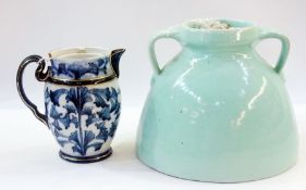 A Brannam Barnstaple two handled vase, with duck egg blue glaze and Macintyre blue and white pottery