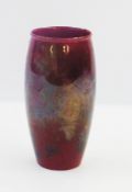 A Crown Ducal flambe lustre pottery vase, ovoid, slender, mottled red and silver glaze, 15cm high