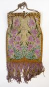 Edwardian/1920's gilt metal bag, the gilt clasp mounts rose spray embossed, having fine mesh body