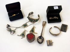 An Indian silver-coloured bracelet and matching earrings, Paris souvenir miniature book, silver-