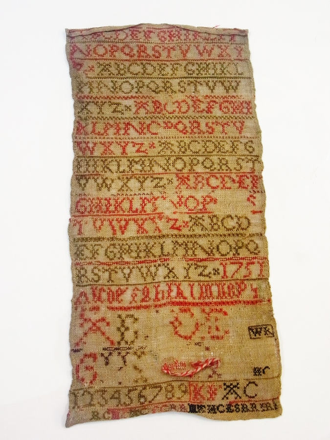 Georgian alphabet sampler dated 1751, unframed 43 x 20cm approx.