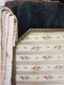 A quilted bedspread and other quilted and embroidered items (1 box)