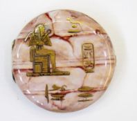 Egyptian style silver-coloured metal and enamel compact, circular, the enamel ground in pink, coral,