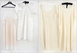 A 1920's cotton broderie anglaise nightgown, a silk chemise, another silk nightdress, a pair of silk