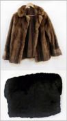 Short mink jacket together with a black beaver muff (2)