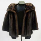 A short mink jacket with shawl collar