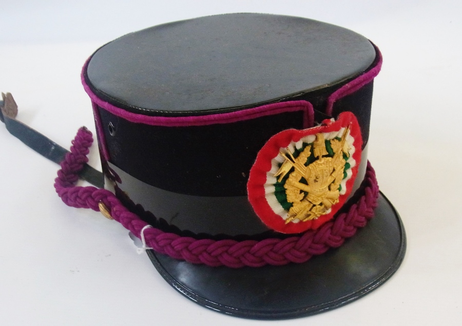 A military cap with patent peak and crown, made by Union Militaire, in box