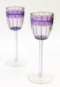 Pair Otto Prutscher for Meyr's Neffe cased and cut purple wine glasses, each with ovoid bowl with