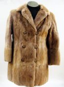 A Faulkes, Edgbaston, Birmingham mink three-quarter length coat, No.21789, double-breasted