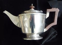 A silver teapot of Art Deco form, Birmingham 1934, 16oz gross