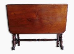 A Victorian mahogany fall-flap Sutherland table having twin turned standards united by a turned pole