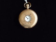 A gold plated half-hunter pocket watch having Swiss made movement