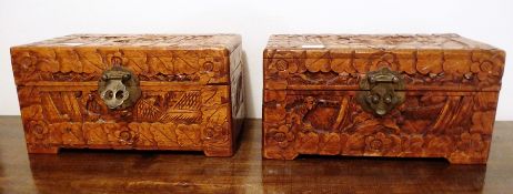 A pair of Oriental carved hardwood boxes, 25cm wide