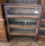 A Globe-Wernicke style oak bookcase of four tiers (af),  86cm wide