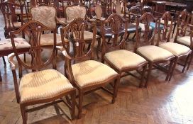 A set of six Rackstraw Hepplewhite-style light wood (probably yew) dining chairs, each with shield-