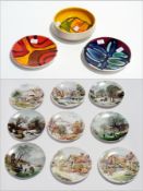 Two Poole pottery trinket dishes, a Poole pottery bowl and a quantity of Poole plates with scenes of