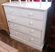 A white painted chest of two short and three long drawers, on plinth base, 112cm wide