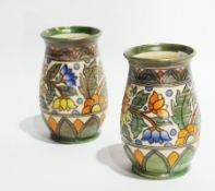 A pair of Crown Ducal vases, by Charlotte Rhead, circa 1930, baluster-shaped, with incised foliate
