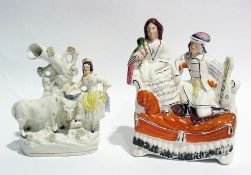 A Staffordshire flatback group of gentleman with lady holding parrot and a Staffordshire spill