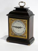 A Garrard & Co reproduction mahogany eight-day bracket-style clock by Elliott of London, presented