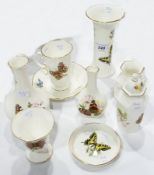 A quantity of Royal Worcester "Butterflies" items to include:- vases, trinket tray, coffee cup, etc.