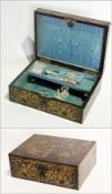 A 19th century brass inlaid hardwood, possibly ebony, workbox, all over pierced brass floral and