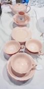 A Wedgwood "Alpine Pink" part tea service to include:- teapot, milk jug, sugar bowl and five teacups