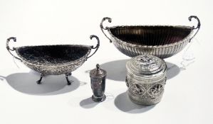 An Art Deco style silver pepperette together with a foreign silver bateau-shaped two-handled