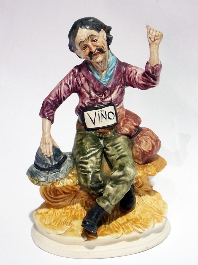 A Capodimonte-style figure "Vino", 33cm high approx.