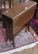 An Edwardian mahogany Sutherland table with slatted sides, undershelf, on elegant square legs, width