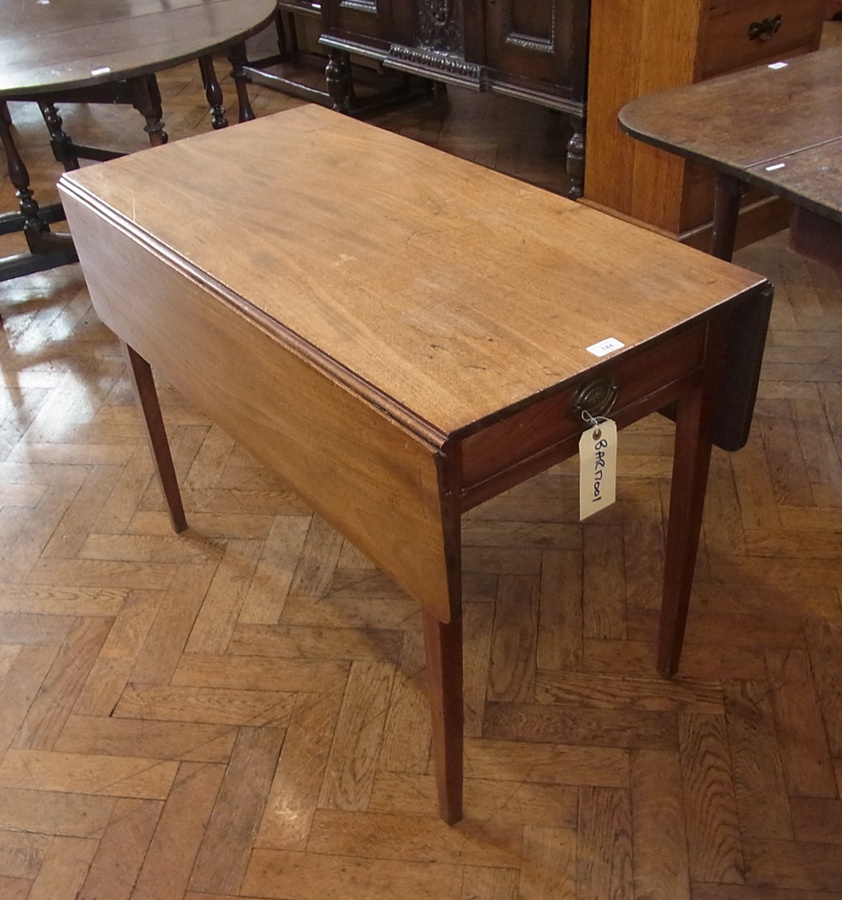 19th century mahogany Pembroke table with frieze drawer and dummy drawer, on tapering supports,