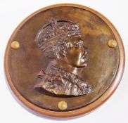 Metal relief plaque of crowned king, possibly Edward VIII, on wooden base