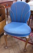 Small occasional chair with blue upholstery on cabriole legs with pad feet