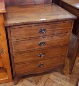 A mahogany cupboard, with four dummy drawers to front and brass handles, enclosing cupboard space,