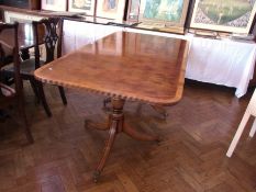 A Rackstraw reproduction yew wood double pedestal dining table with reeded border, on turned