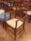 An Edwardian inlaid open armchair with rail-back, chequered inlay,  padded seat, on spade