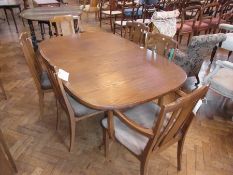 A G-Plan oak extending dining table, 98cm and a set of six G-Plan dining chairs, with G-Plan