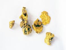 Six nuggets of gold-coloured metal, probably gold, 9.2g approx.