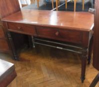 A Victorian mahogany rectangular top side table with quadrant moulding, pair of frieze drawers on
