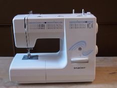 A "Silvercrest" sewing machine in box