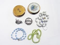 Two Stratton compacts, a silver brooch, a silver and marcasite brooch and three various bead