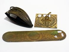 19th century engraved brass fingerplate, small brass sundial and a brass horse attachment